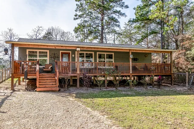 a view of a swimming pool with a lounge chair
