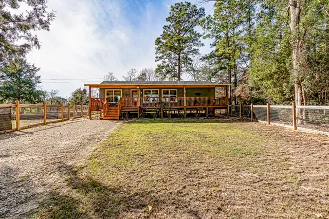 a view of a park with swings and slides