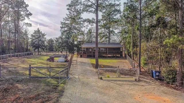a view of a playground with basketball court