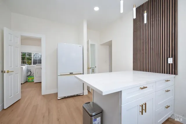 a view of a balcony with wooden floor
