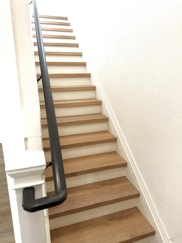 a room with a bed and a window