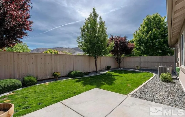a view of a backyard with a garden