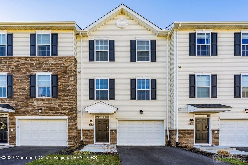 304 Discovery Road, Unit 1804 Brick, NJ 08723 - Photo 1 of 48 a front view of a house with yard
