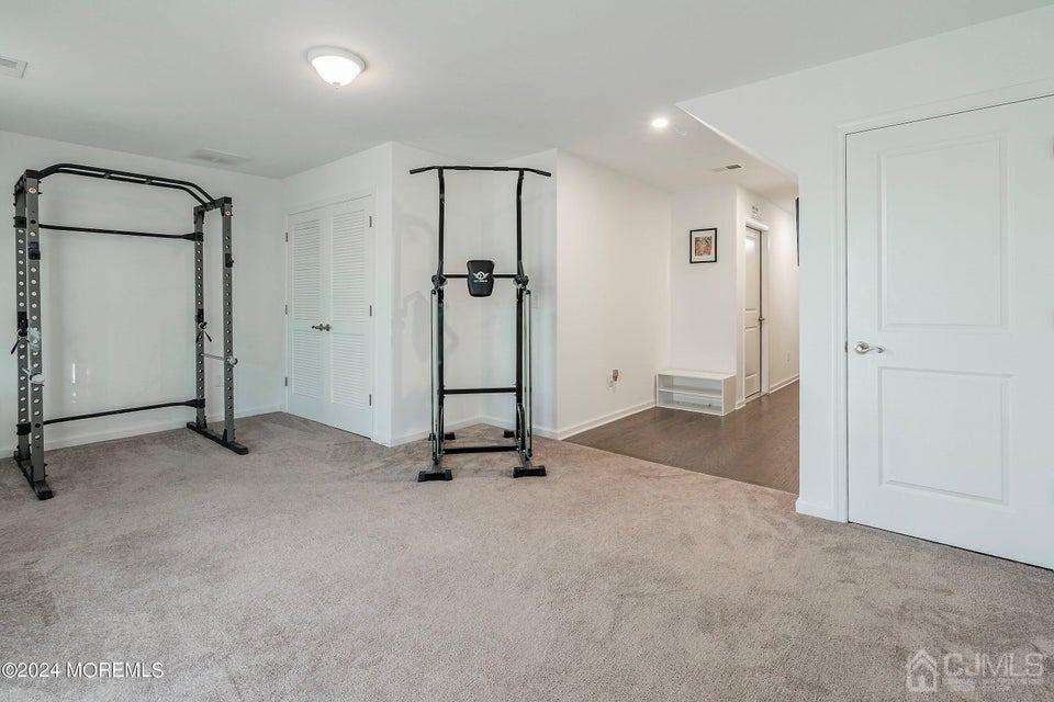304 Discovery Road, Unit 1804 Brick, NJ 08723 - Photo 39 of 48 a view of a room with gym equipment