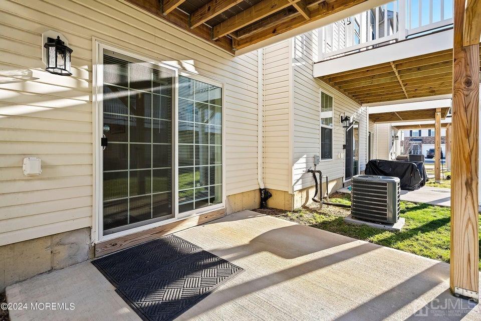 304 Discovery Road, Unit 1804 Brick, NJ 08723 - Photo 40 of 48 a front view of a house with a yard