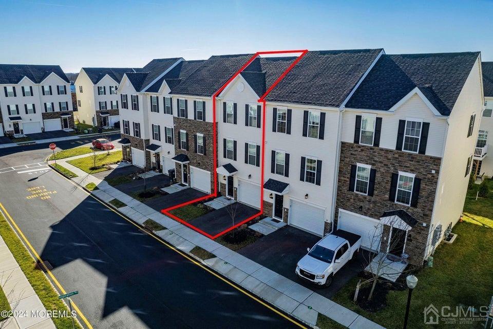 304 Discovery Road, Unit 1804 Brick, NJ 08723 - Photo 6 of 48 a aerial view of multiple house