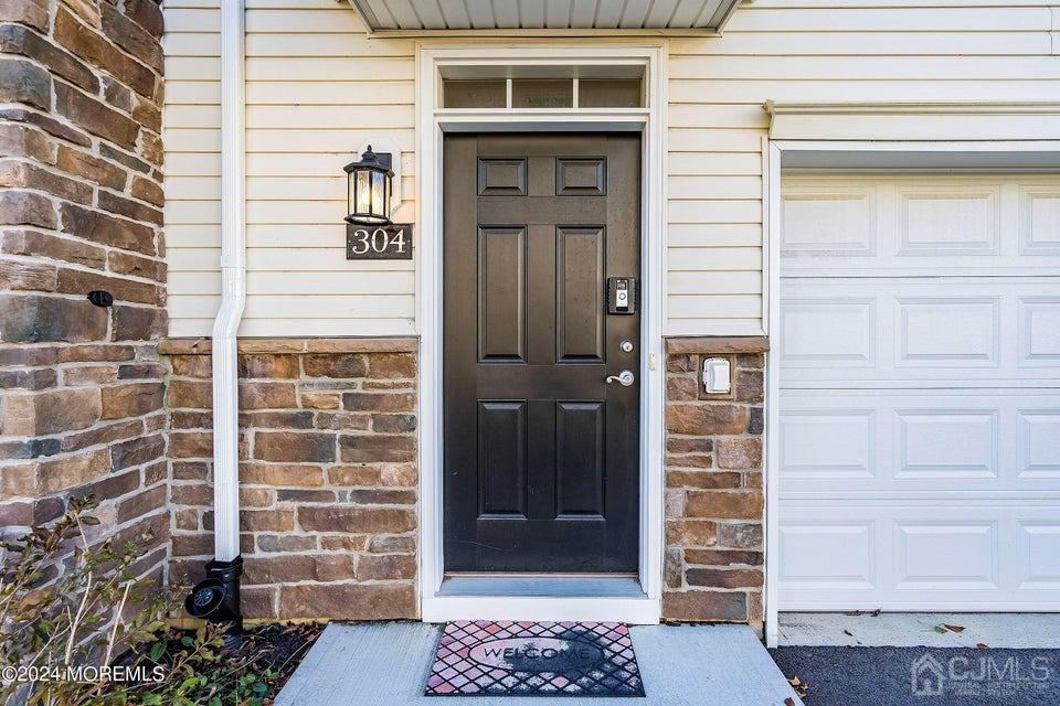 304 Discovery Road, Unit 1804 Brick, NJ 08723 - Photo 10 of 48 a front view of a house with a shower