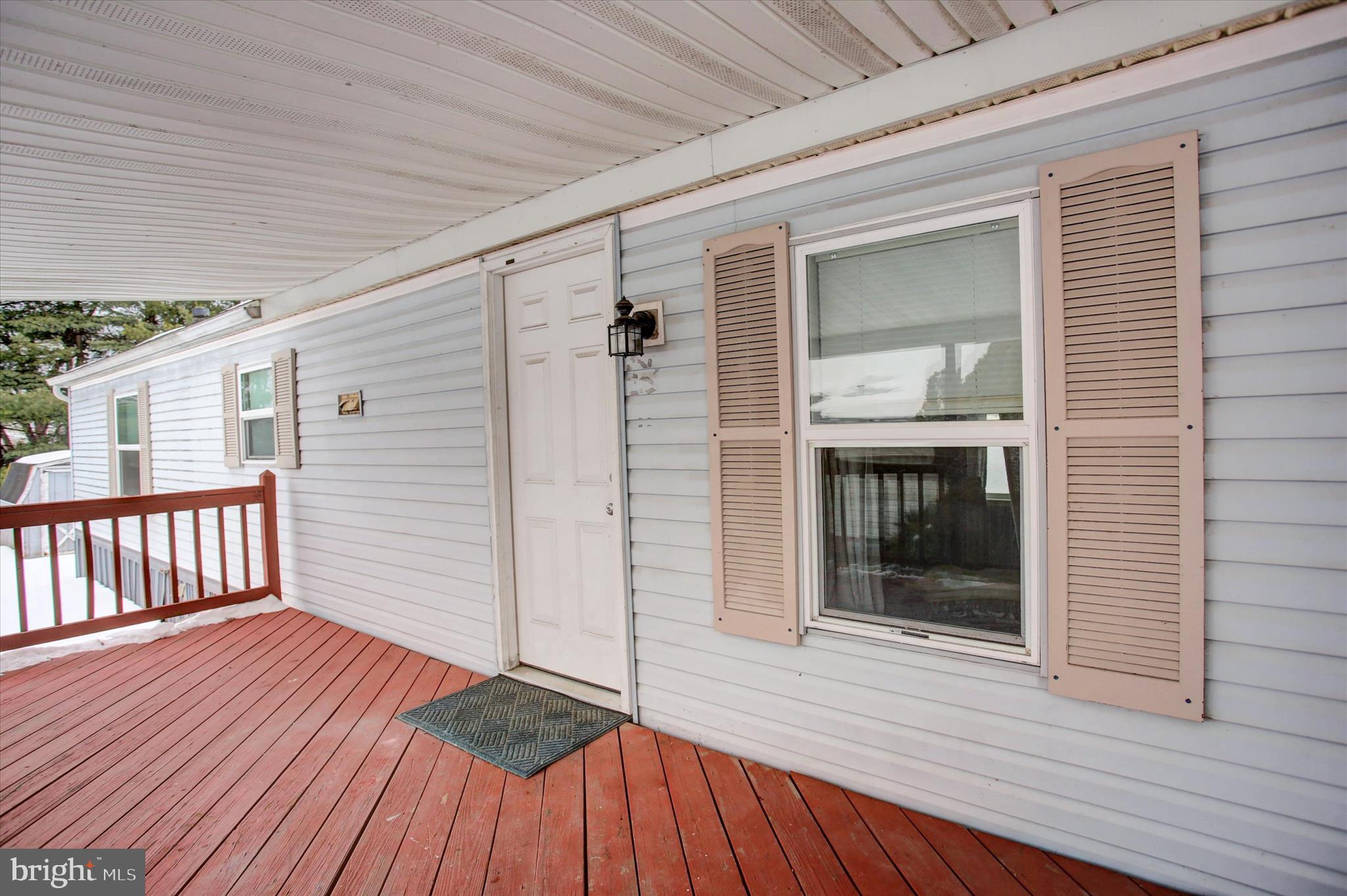188 Rustic Drive Shippensburg, PA 17257 - Photo 20 of 24 a view of a porch with wooden floor and fence