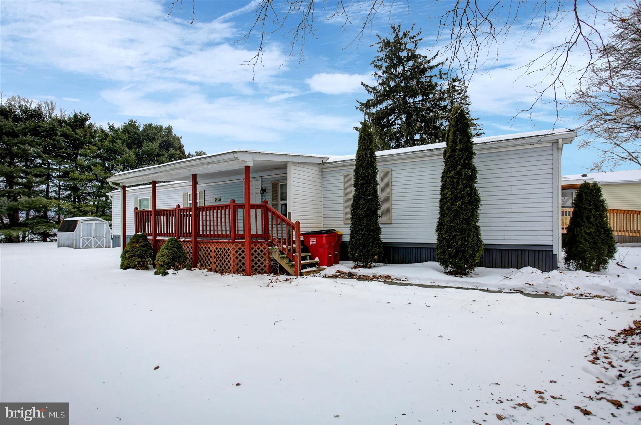 188 Rustic Drive Shippensburg, PA 17257 - Photo 2 of 24 a view of a house with a yard covered in snow