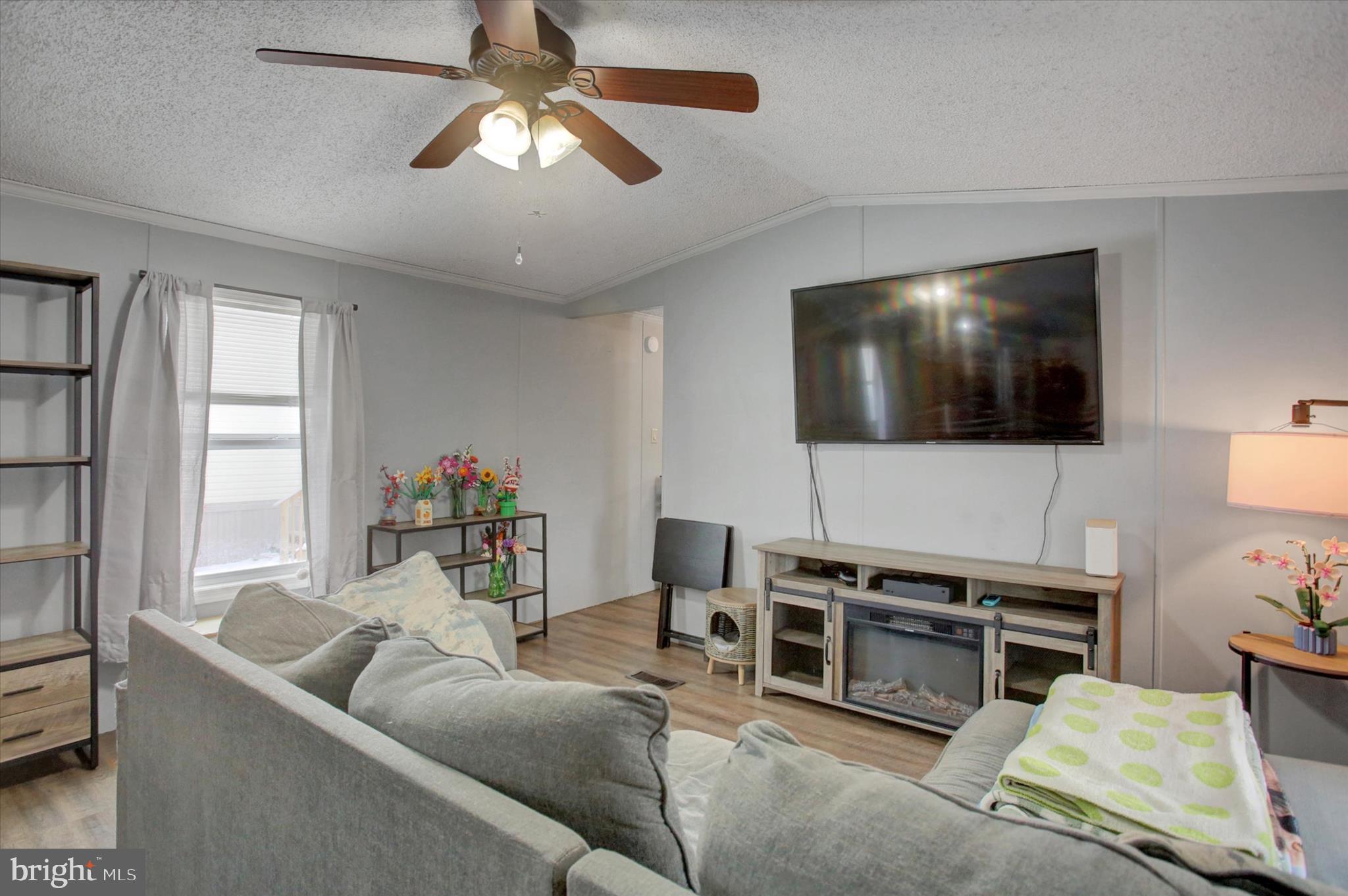 188 Rustic Drive Shippensburg, PA 17257 - Photo 5 of 24 a living room with furniture and a flat screen tv