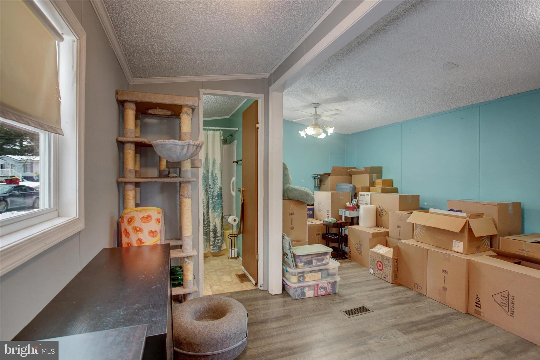 188 Rustic Drive Shippensburg, PA 17257 - Photo 6 of 24 a living room with furniture and a wooden floor
