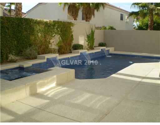 3736 Port Ritchey Street Las Vegas, NV 89147 - Photo 21 of 25 Swimming Pool/Hot Tub/Sauna. Beautiful deep blue glass tile heated self-cleaning pool and spa with 3 waterfalls