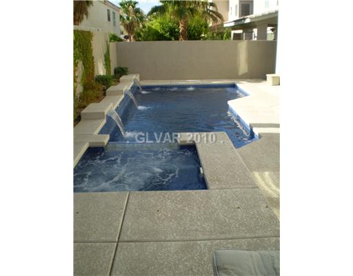 3736 Port Ritchey Street Las Vegas, NV 89147 - Photo 22 of 25 Swimming Pool/Hot Tub/Sauna. Low maintenance backyard complete with cool-deck, ivy and shrubs. Toddler-safe fence is easy to install into the soffits in the deck