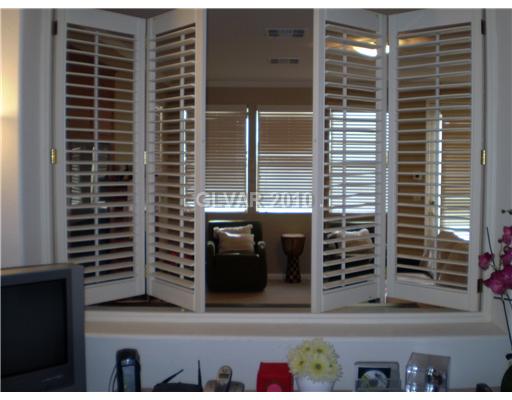 3736 Port Ritchey Street Las Vegas, NV 89147 - Photo 6 of 25 Den. The den is separated from the family room with shutters