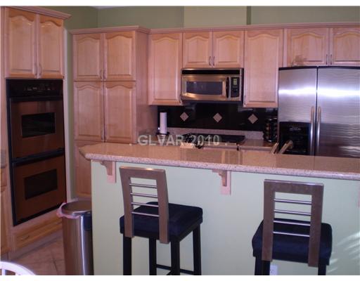 3736 Port Ritchey Street Las Vegas, NV 89147 - Photo 9 of 25 Kitchen. Stainless steel appliances including a double oven