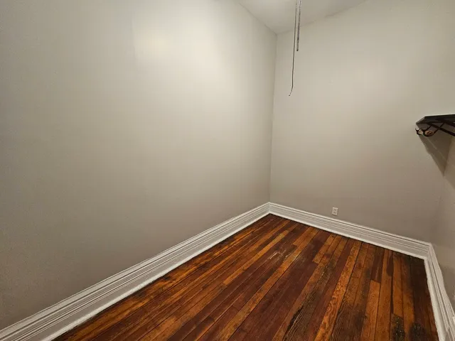 a view of small space with racks on the wall