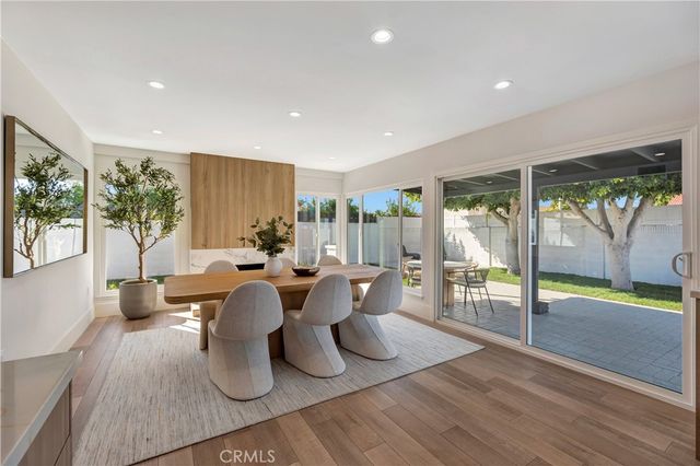 a view of hallway with wooden floor