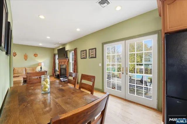 a living room with furniture window and wooden floor