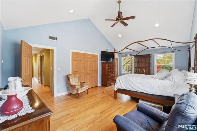 a bed room with a bed and furniture