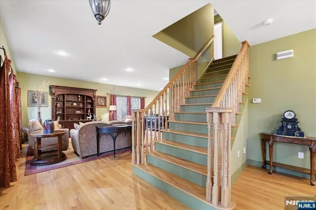 a view of livingroom with furniture and workspace