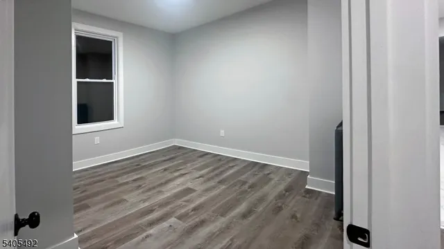 a view of kitchen and kitchen with a wooden floor