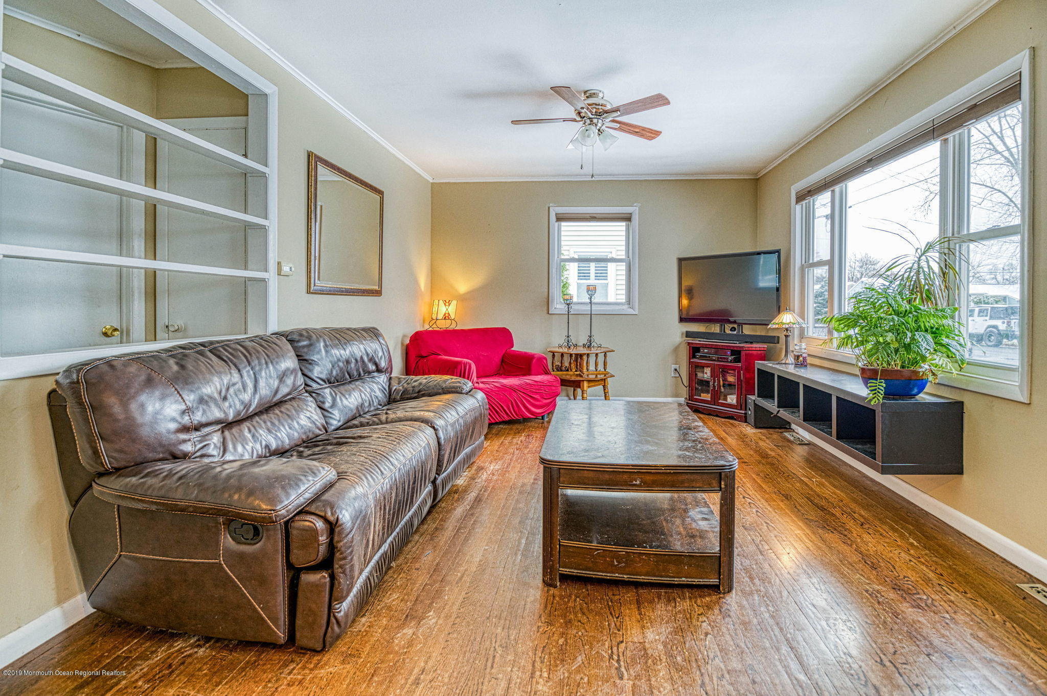 3210 Kickapoo Avenue Point Pleasant, NJ 08742 - Photo 6 of 16 a living room with furniture and a flat screen tv
