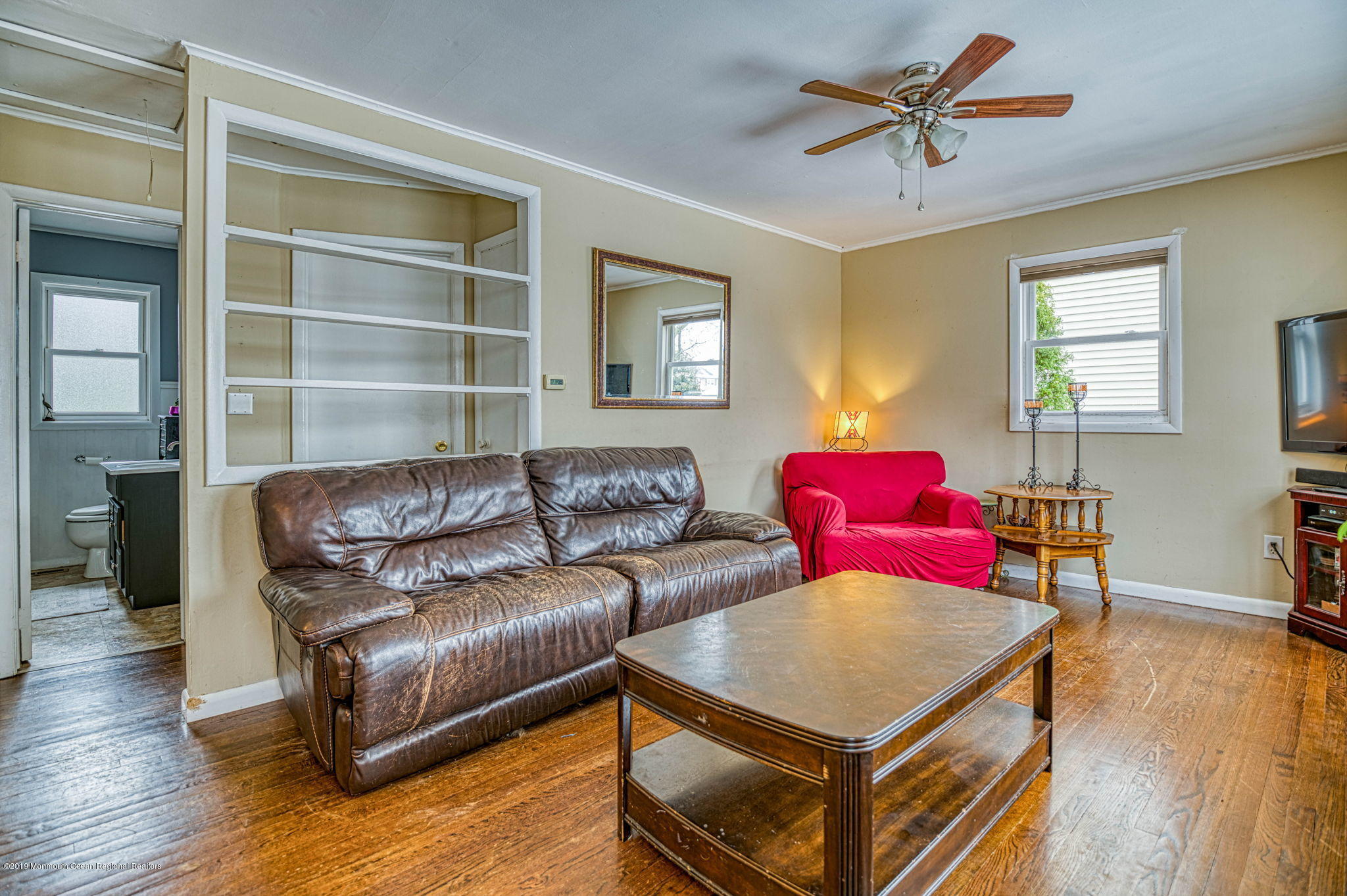 3210 Kickapoo Avenue Point Pleasant, NJ 08742 - Photo 7 of 16 a living room with furniture and a wooden floor