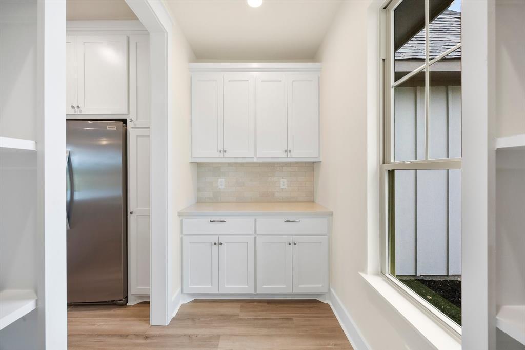 14740 County Road 355 Terrell, TX 75161 - Photo 10 of 31 Walk-in pantry with coffee bar and shelves
