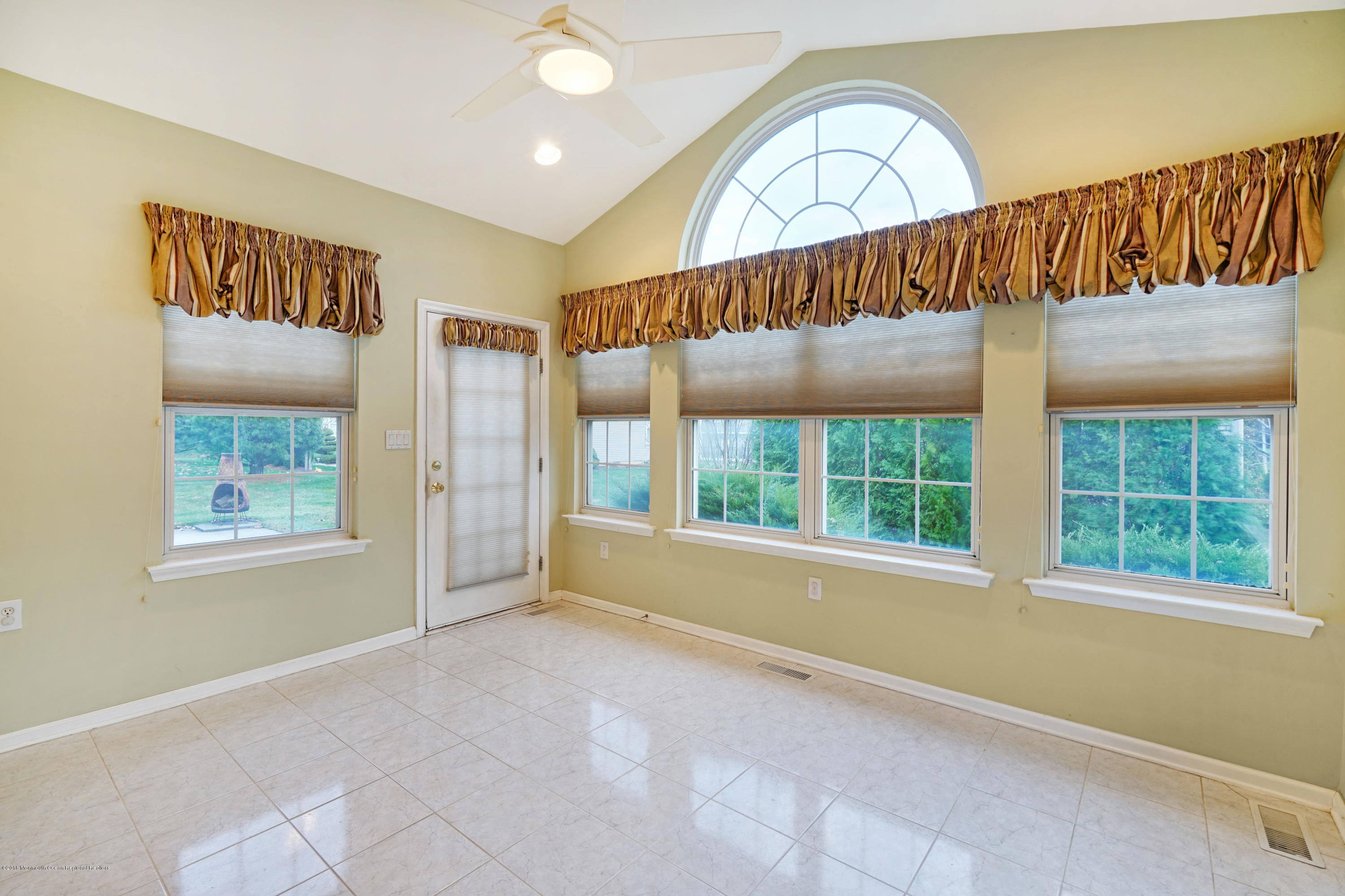 28 Eleanor Road Manchester Township, NJ 08759 - Photo 14 of 29 Sun Room Leading to Backyard