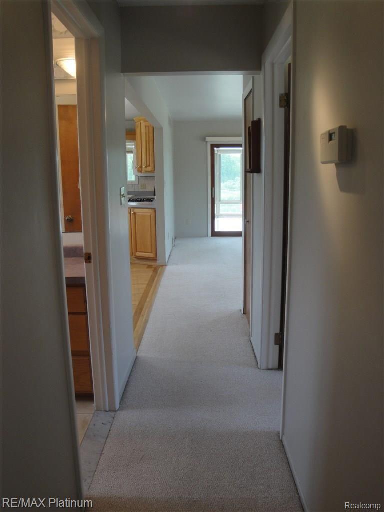 4250 Crandall Road Howell, MI 48855 - Photo 28 of 57 Hall from bedrooms looking toward living/kitchen areas