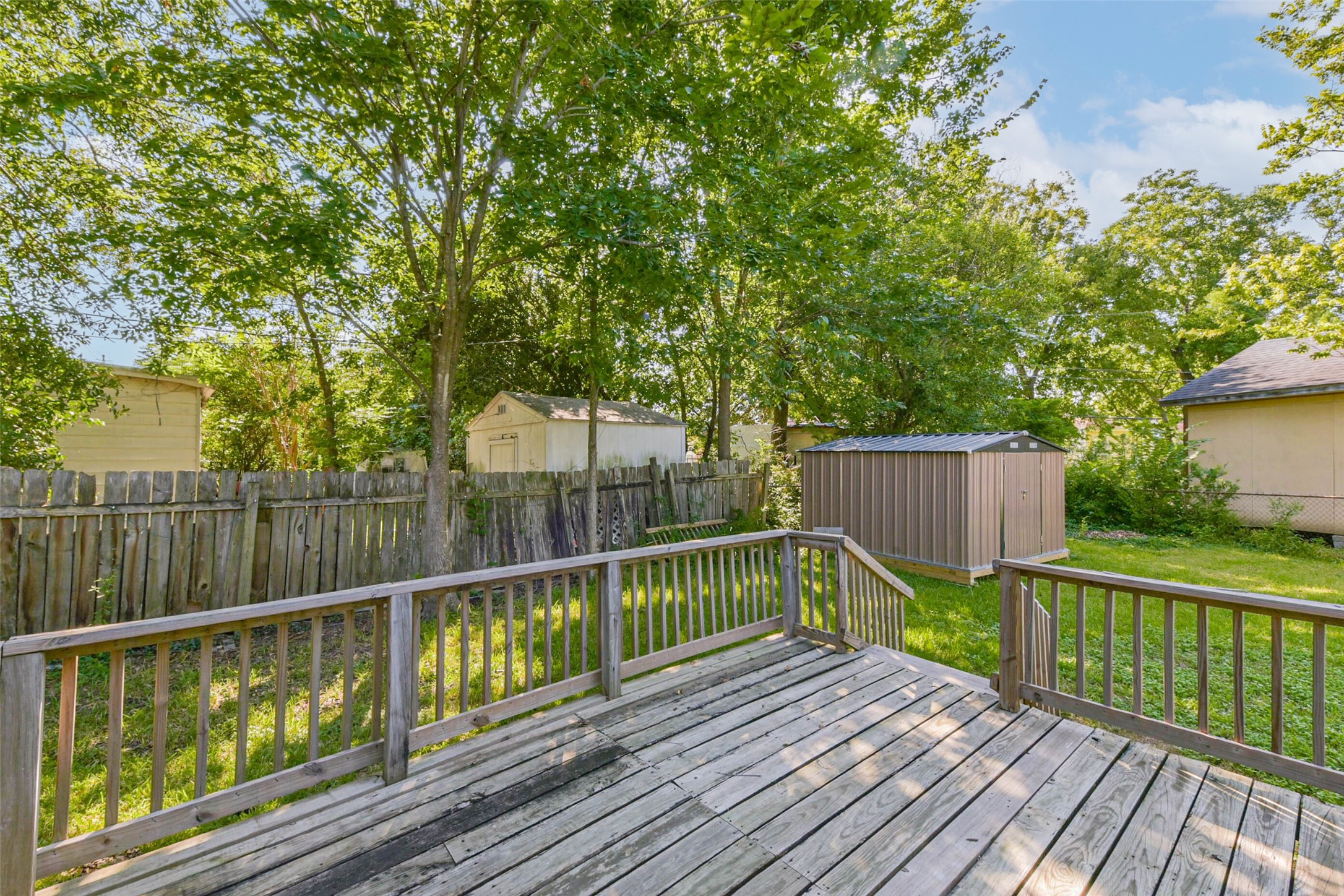 1102 West Hart Avenue Pasadena, TX 77506 - Photo 13 of 40 a view of balcony with wooden floor and fence