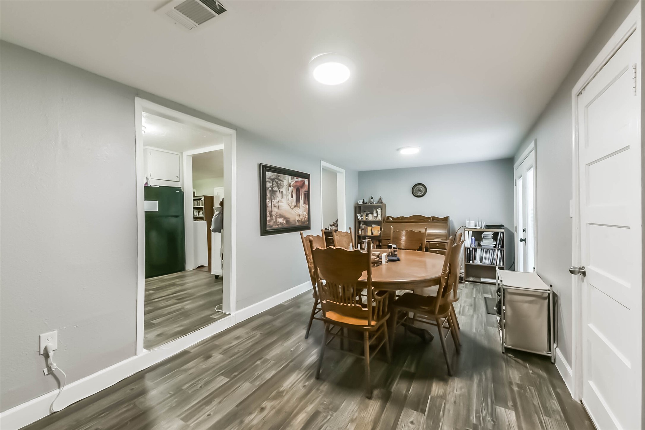 1102 West Hart Avenue Pasadena, TX 77506 - Photo 28 of 40 a view of a dining room with furniture and wooden floor