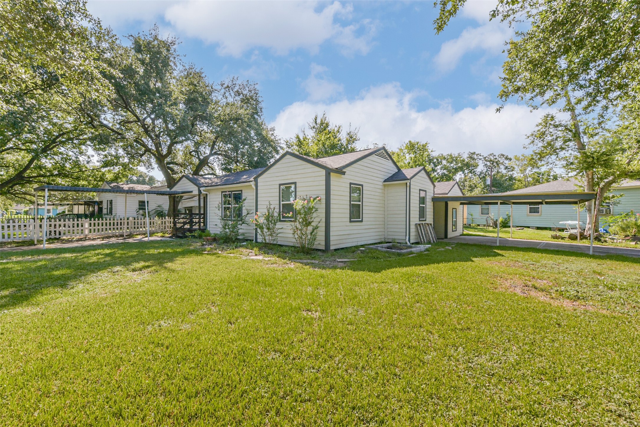 1102 West Hart Avenue Pasadena, TX 77506 - Photo 5 of 40 a front view of a house with swimming pool