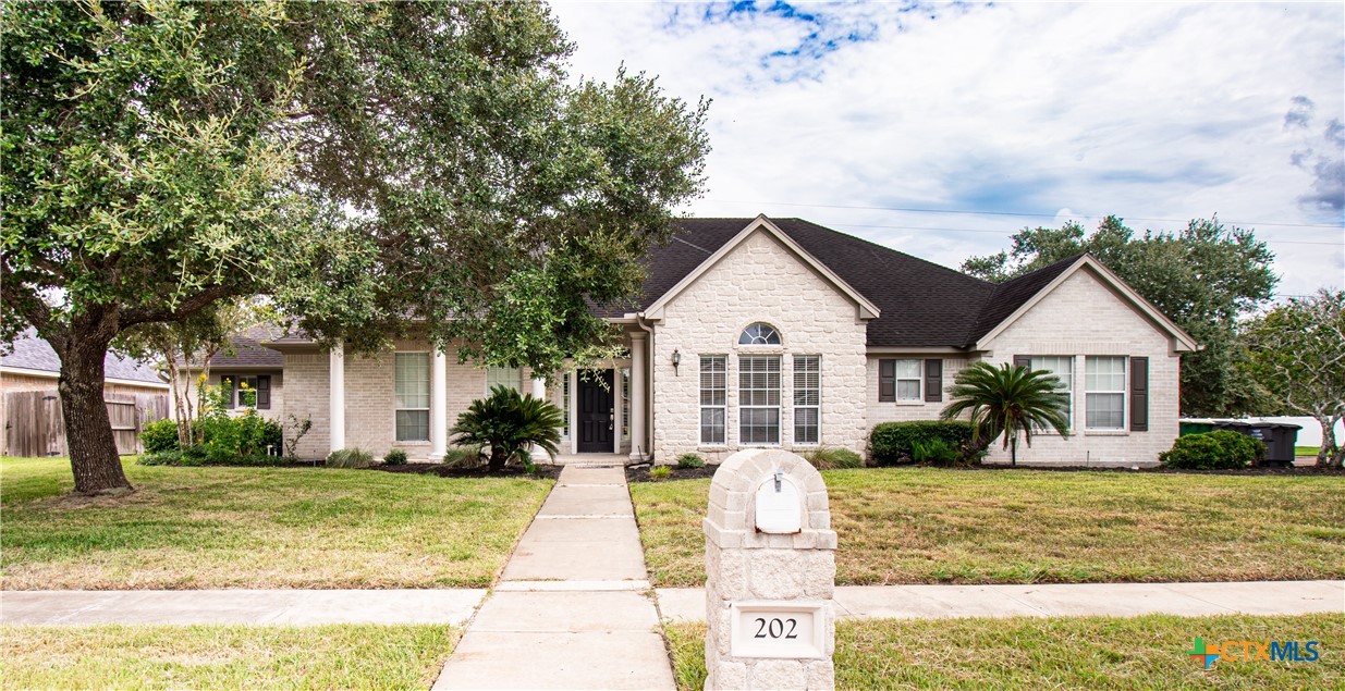 202 Ridge View Victoria, TX 77904 - Photo 2 of 41 a front view of a house with garden