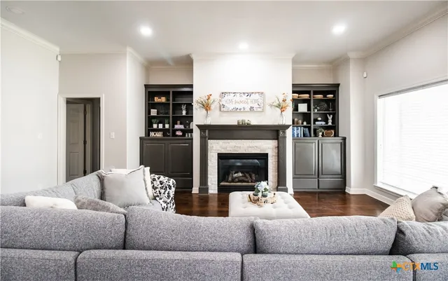 a kitchen with stainless steel appliances a stove a sink and a refrigerator