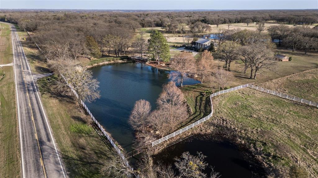 6569 Fm 2947, Unit 4 Quinlan, TX 75474 - Photo 13 of 37 a view of a lake in middle of the town
