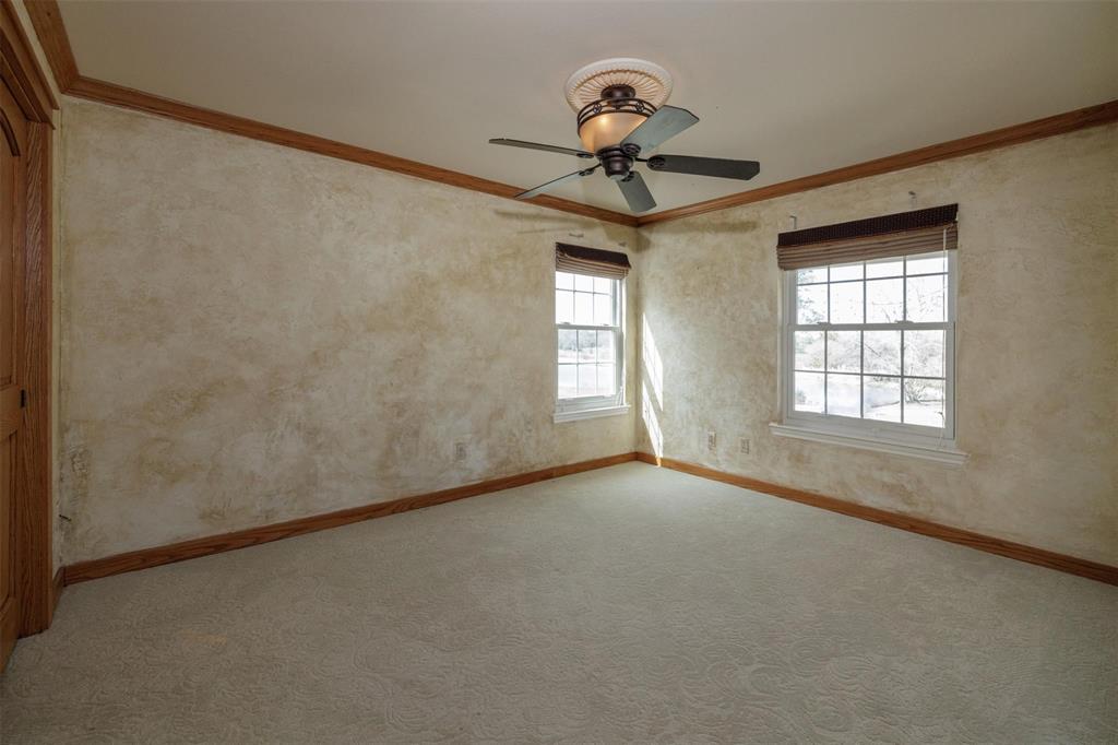 6569 Fm 2947, Unit 4 Quinlan, TX 75474 - Photo 17 of 37 an empty room with a window