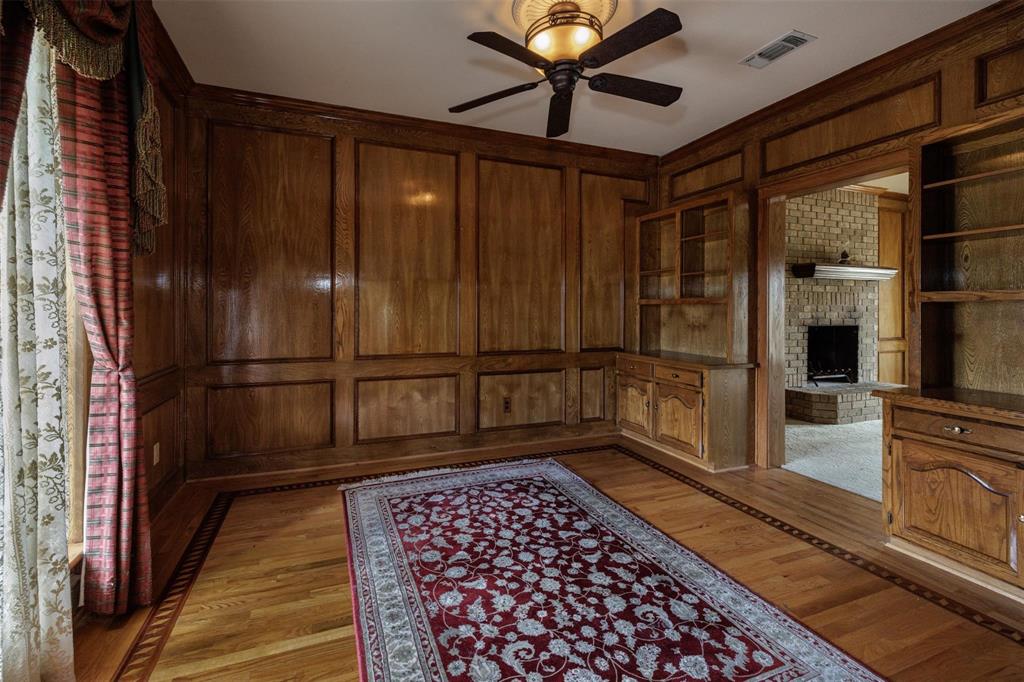 6569 Fm 2947, Unit 4 Quinlan, TX 75474 - Photo 21 of 37 a walk in closet with wooden floor