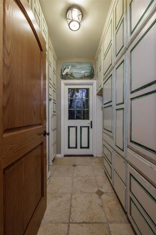 6569 Fm 2947, Unit 4 Quinlan, TX 75474 - Photo 24 of 37 a view of a hallway with a elevator