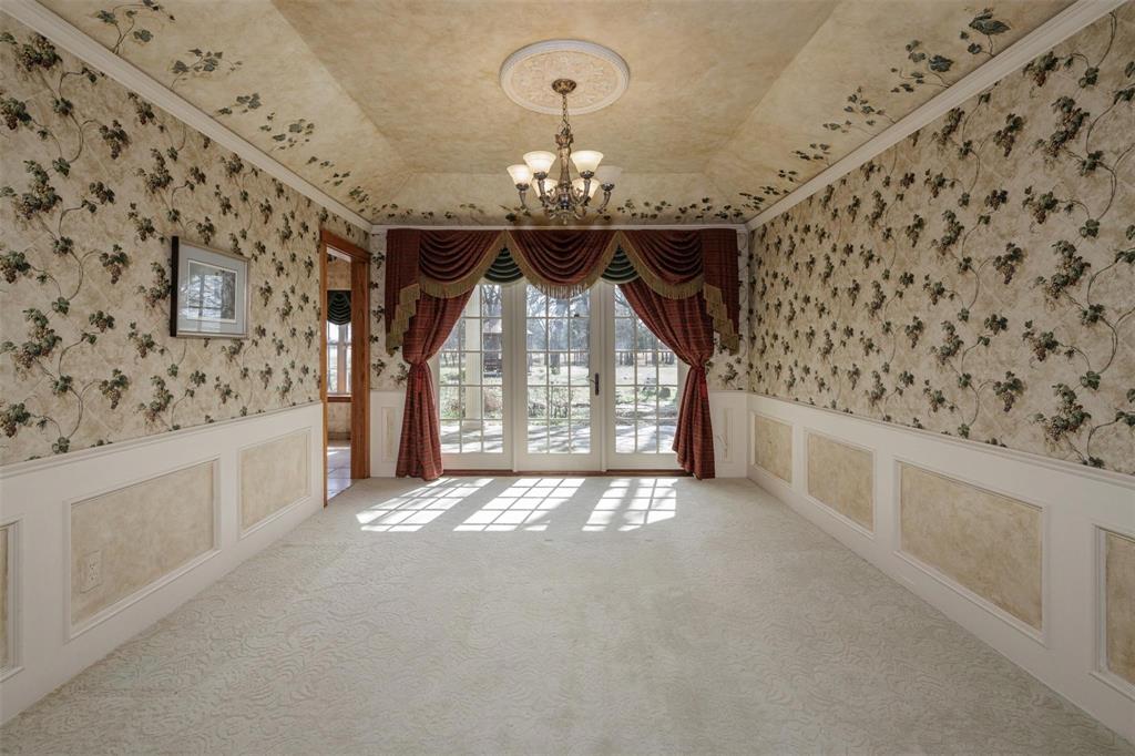 6569 Fm 2947, Unit 4 Quinlan, TX 75474 - Photo 29 of 37 wooden floor in an empty room with a window