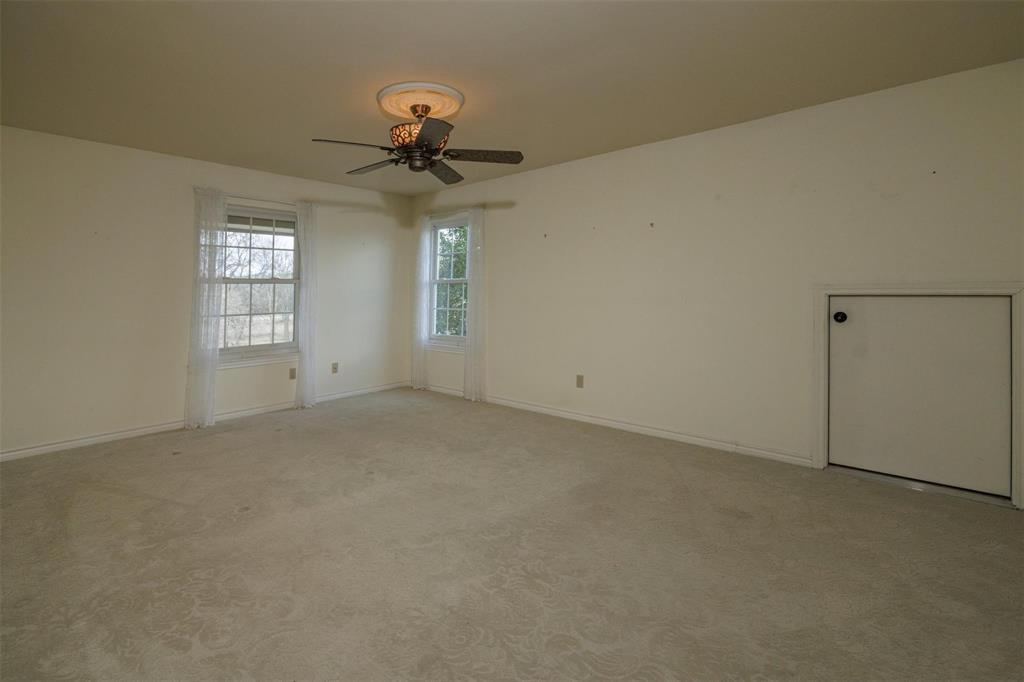 6569 Fm 2947, Unit 4 Quinlan, TX 75474 - Photo 34 of 37 a view of an empty room with a window