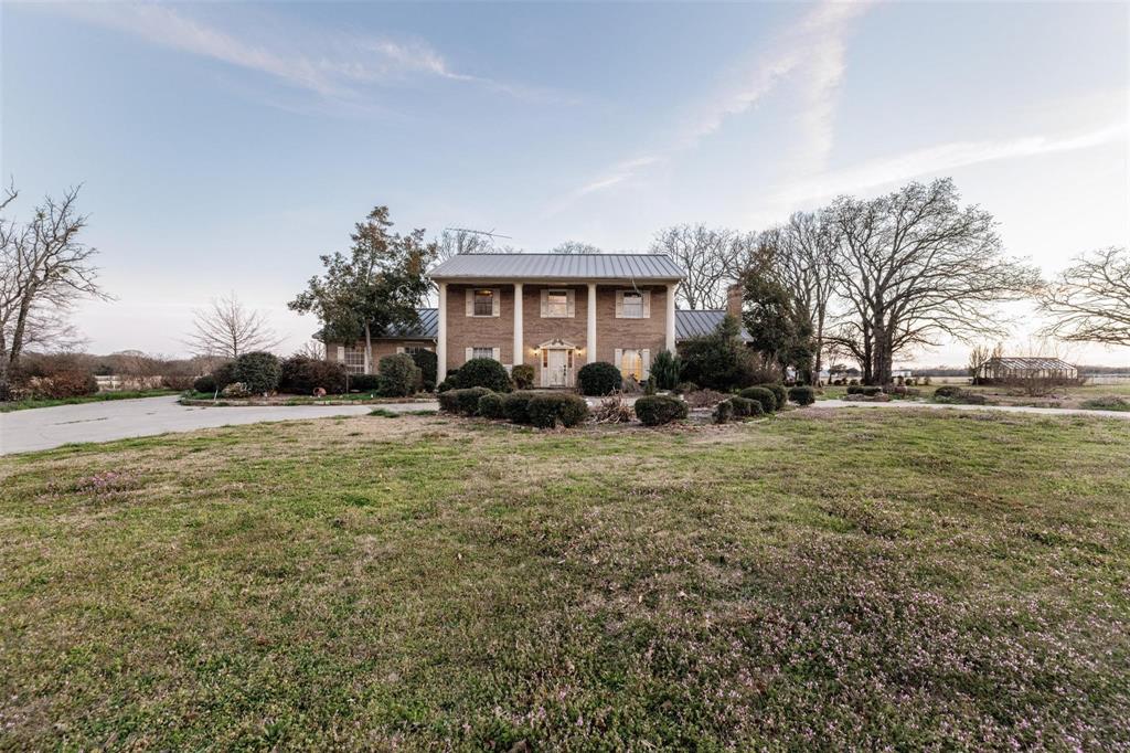 6569 Fm 2947, Unit 4 Quinlan, TX 75474 - Photo 37 of 37 a view of a house with a yard