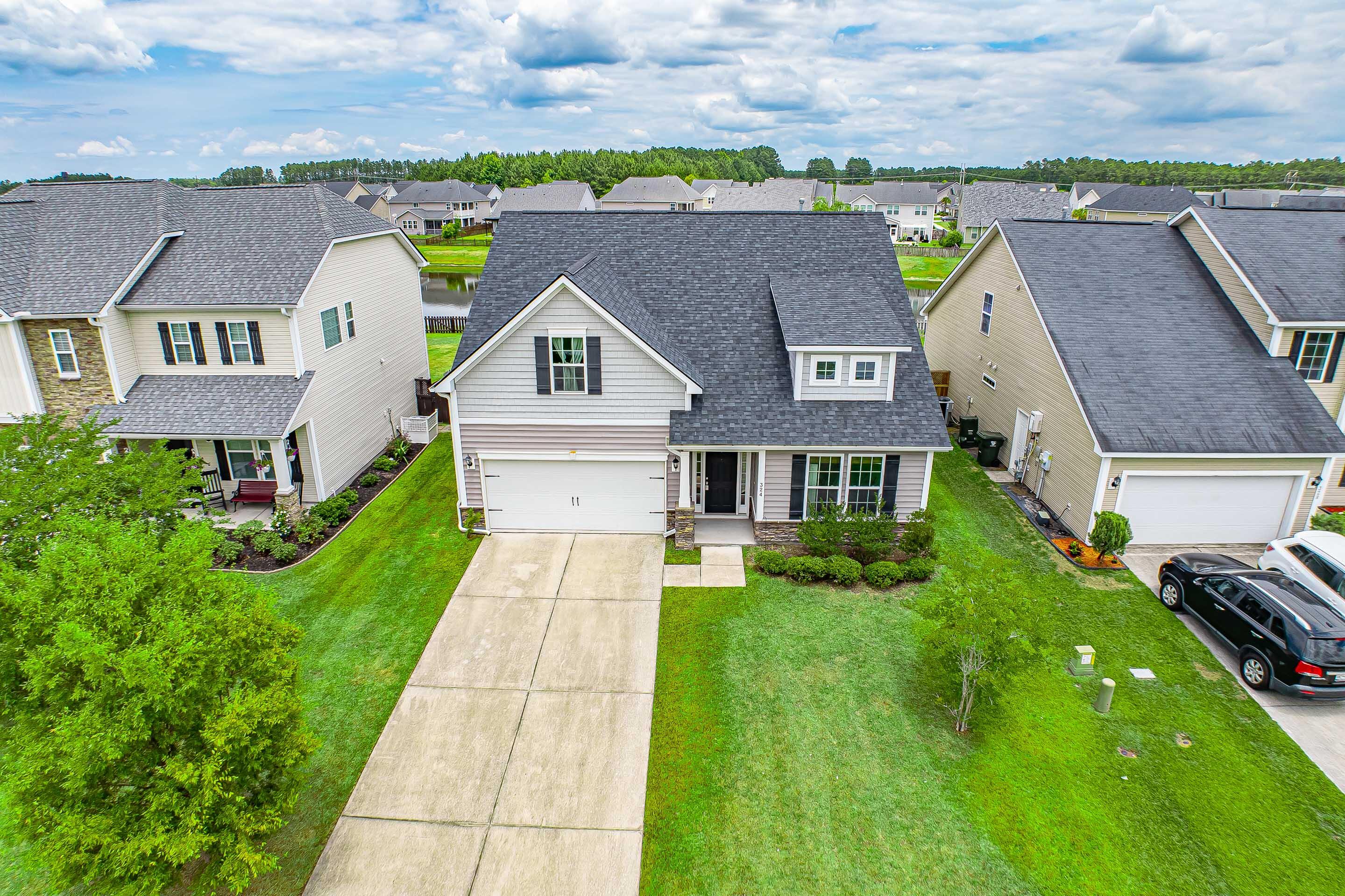 324 Spectrum Road Summerville, SC 29486 - Photo 2 of 71 DJI_20240603133943_0028_D