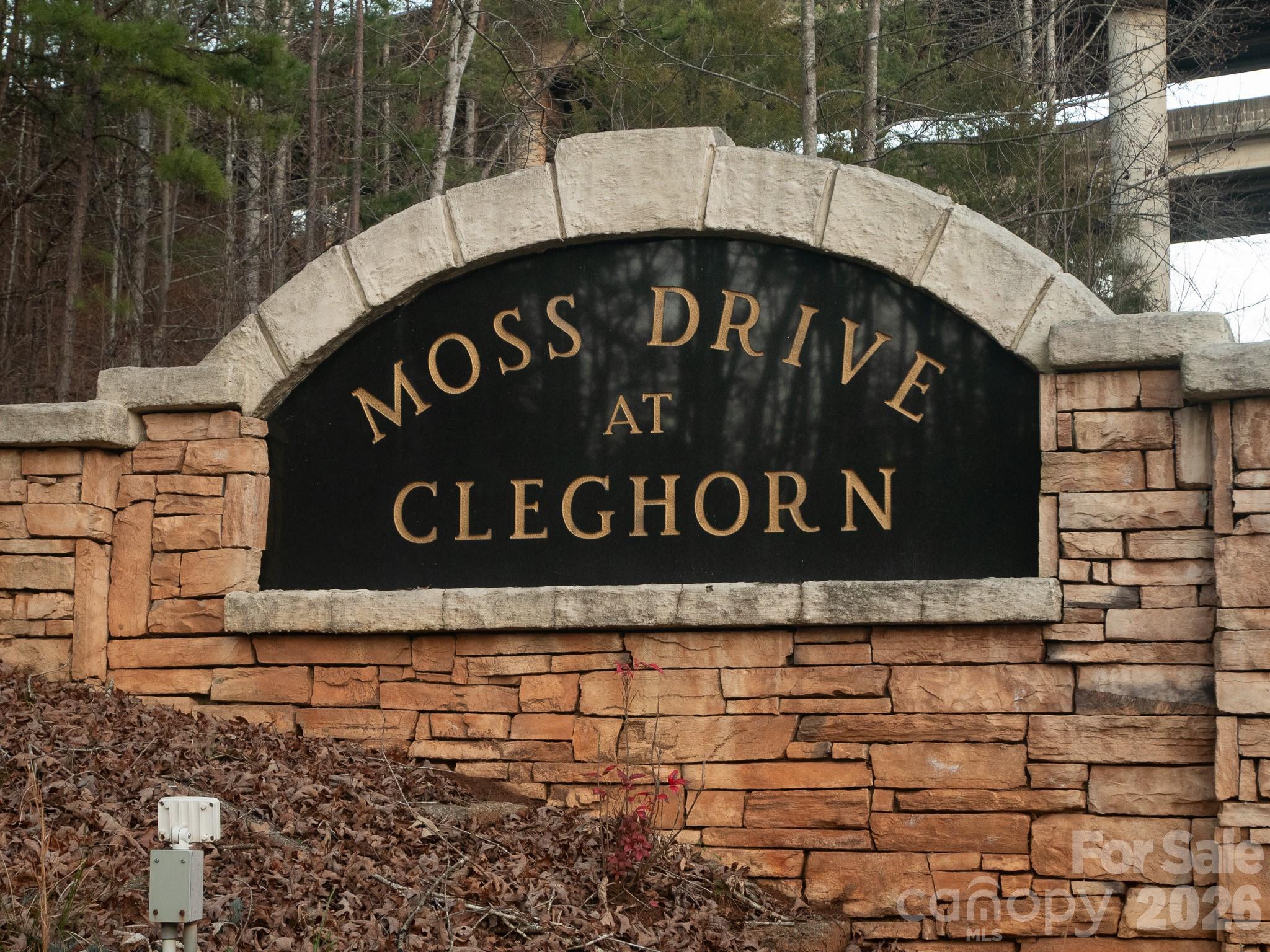 a sign broad on the side of a road