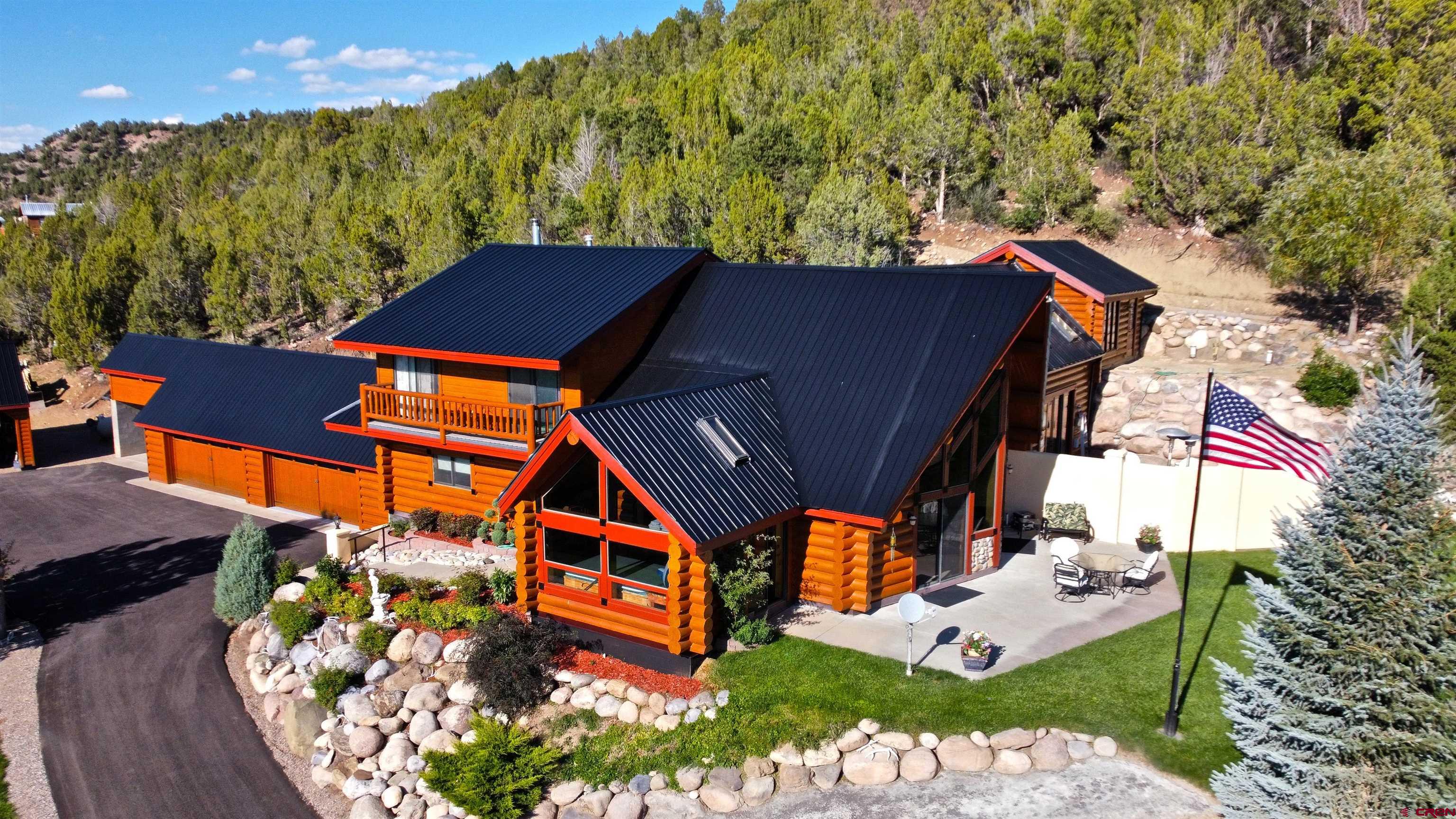 422 North Rainbow Road Durango, CO 81303 - Photo 4 of 34 an aerial view of multiple houses with yard