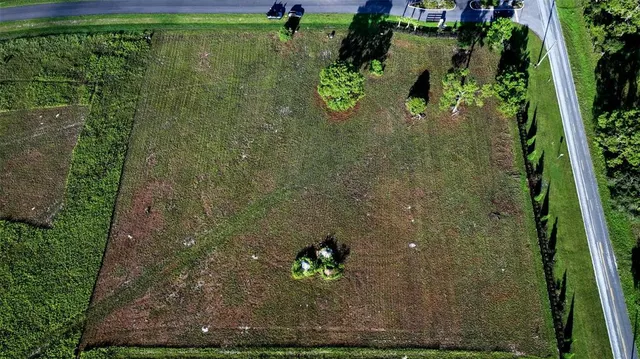 a view of a lake with a yard