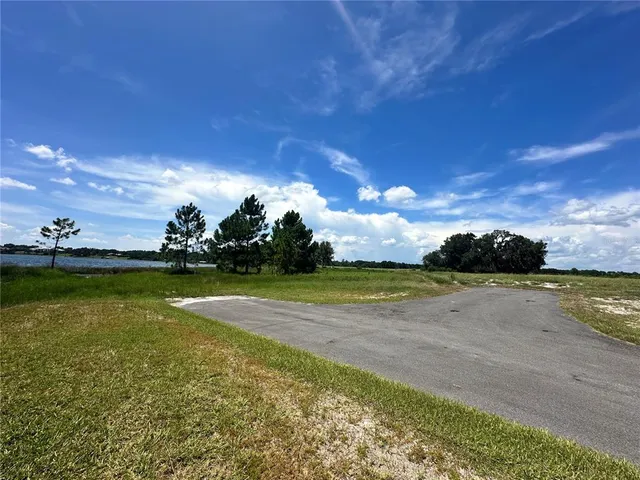 a view of a lake with beach