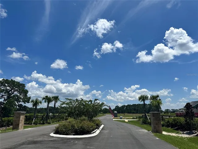 a view of a fountain in the middle of a garden
