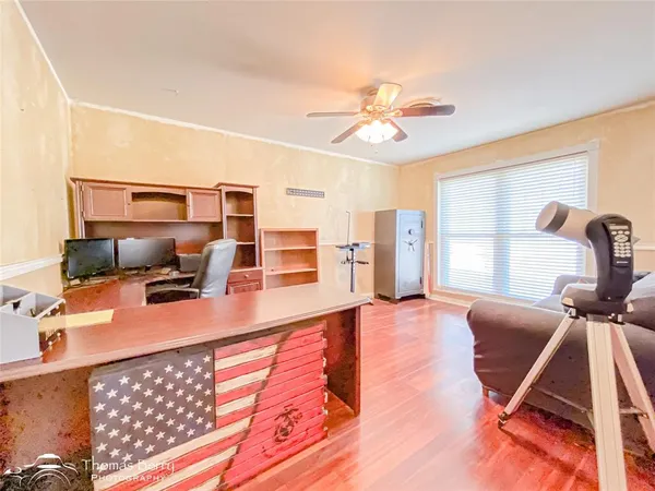 a view of a living room and a workspace
