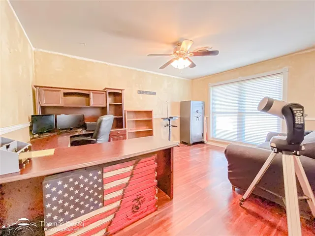 a view of a living room and a workspace